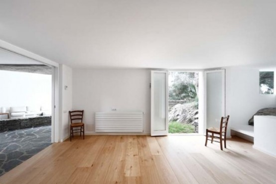 Rustic House With Massive Rock Formations In The Interior Rustic House With Massive Rock Formations In The Interior