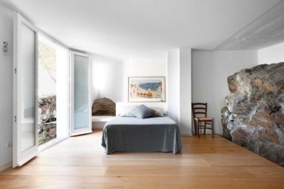 Rustic House With Massive Rock Formations In The Interior Rustic House With Massive Rock Formations In The Interior