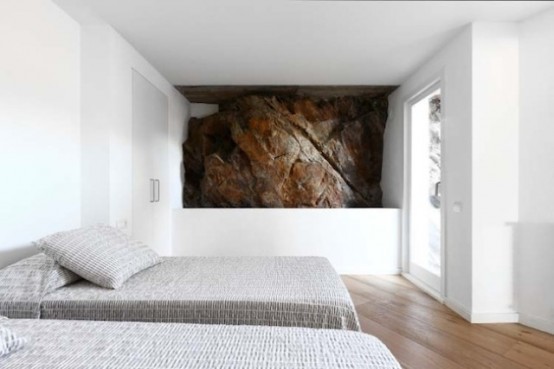 Rustic House With Massive Rock Formations In The Interior Rustic House With Massive Rock Formations In The Interior