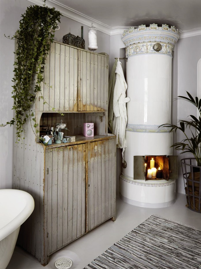 Shabby Chic Bathroom Design With A Hearth And A Sideboard