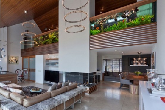 Stylish And Dramatic Apartment With A Big Aquarium