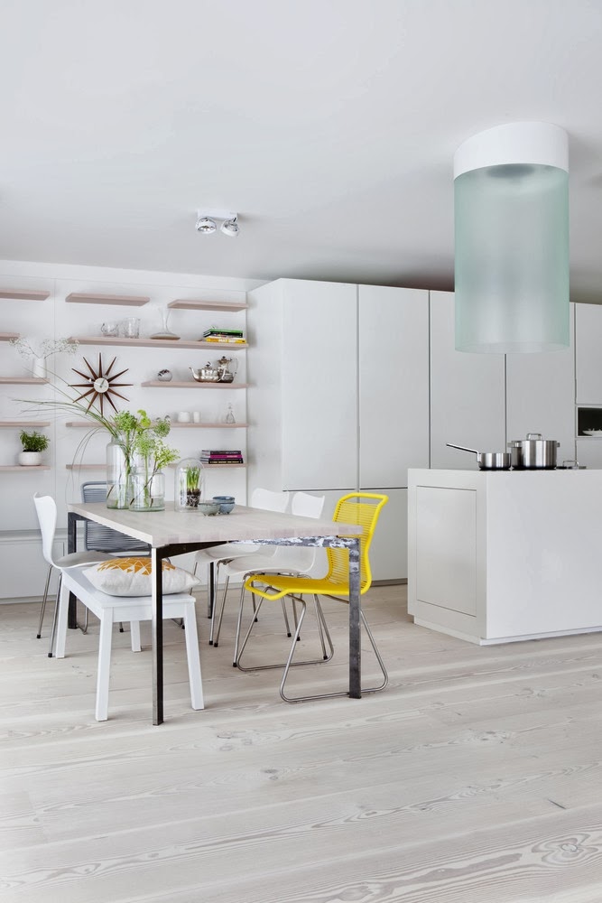 Stylish Minimalist Kitchen With Bright Yellow Accents | DigsDigs