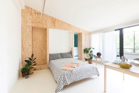 Tiny Bapitin Flat With Minimal Design And Bold Splashes Tiny Bapitin Flat With Minimal Design And Bold Splashes