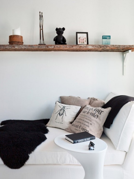 Tiny Black And White Studio With Wood Accents Tiny Black And White Studio With Wood Accents
