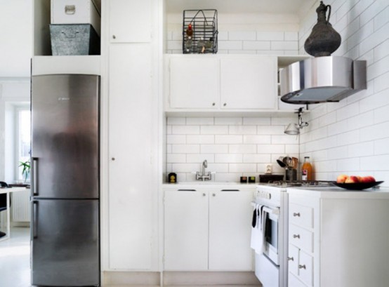 Tiny Black And White Studio With Wood Accents Tiny Black And White Studio With Wood Accents
