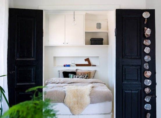 Tiny Black And White Studio With Wood Accents Tiny Black And White Studio With Wood Accents
