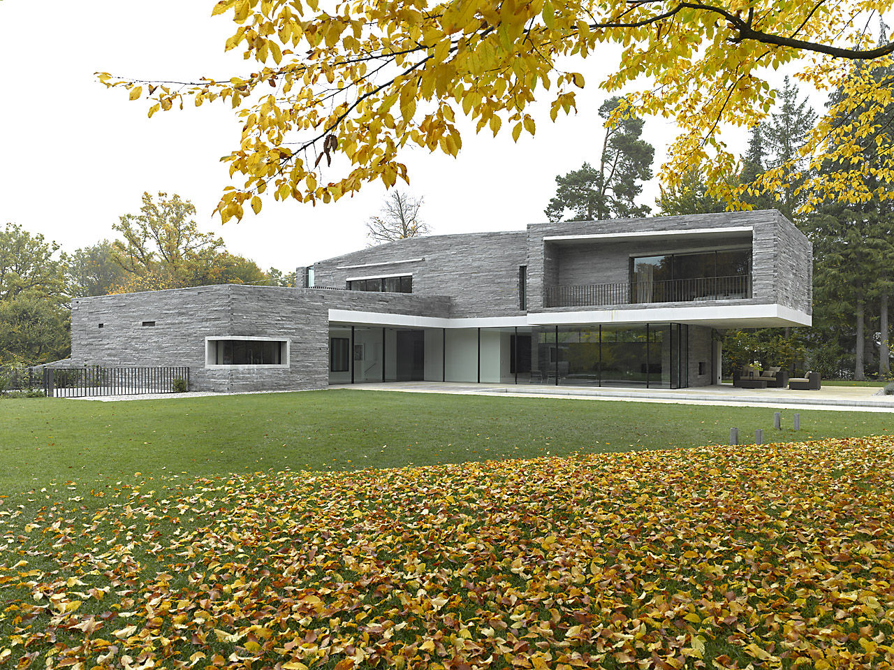 Two-Story House with Rough Stone Facade – House M | DigsDigs