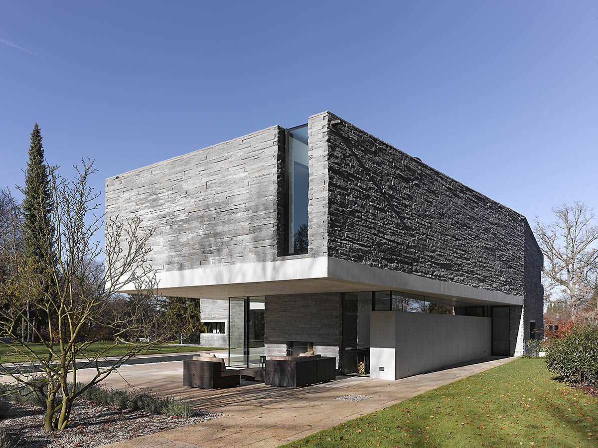 Two-Story House with Rough Stone Facade – House M | DigsDigs