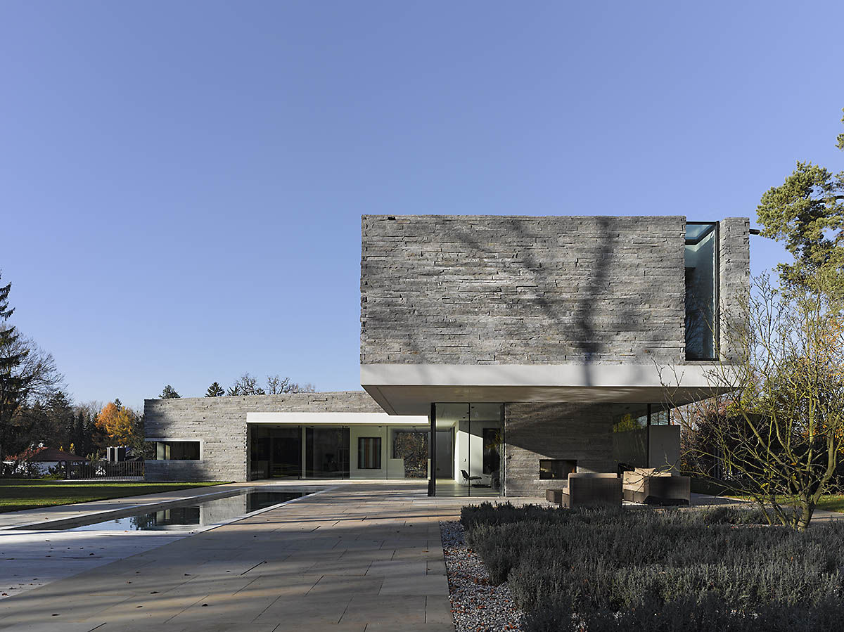 Two-Story House with Rough Stone Facade – House M | DigsDigs