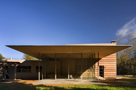 wooden-house-exterior-creekside-residence