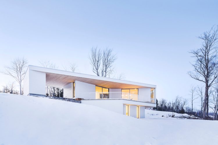 All white from the outside Nook Residence is located in Quebec, Canada