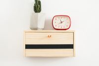 01 Floating Shelf doubles as a charging station