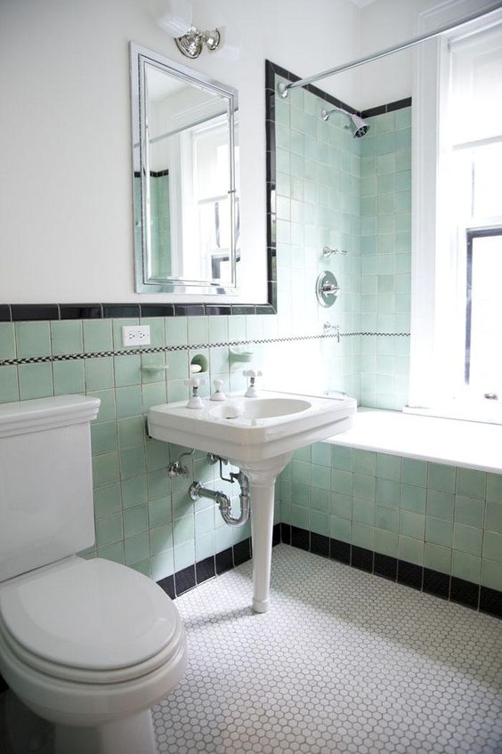 Accentuating Black Border Tiles On The Bathroom Walls