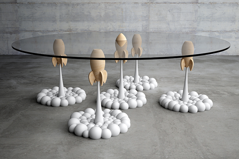 the Rocket table brings fluffy, cartoon like clouds and aerial rockets from a personal toy collection to life