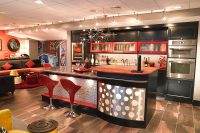 04 70s-inspired basement bar with red touches