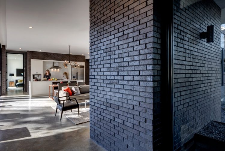 black brick clad adds drama to the decor