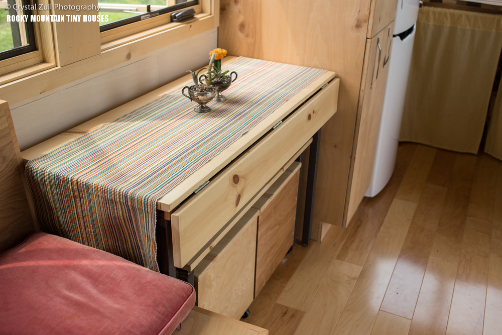 The furniture is also made of light-colored natural wood