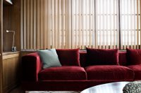 05 neutral living room with a bold red sofa