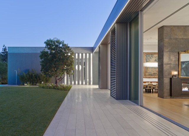 The house is opened to outdoors with giant windows and doors but can be closed if it's hot