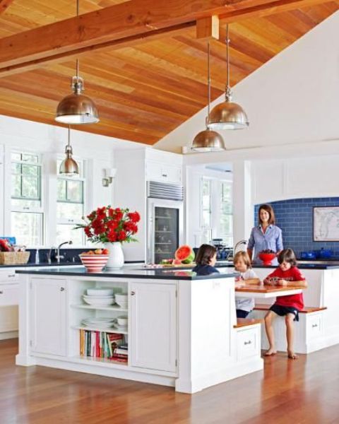 kitchen island with a built-in eating area