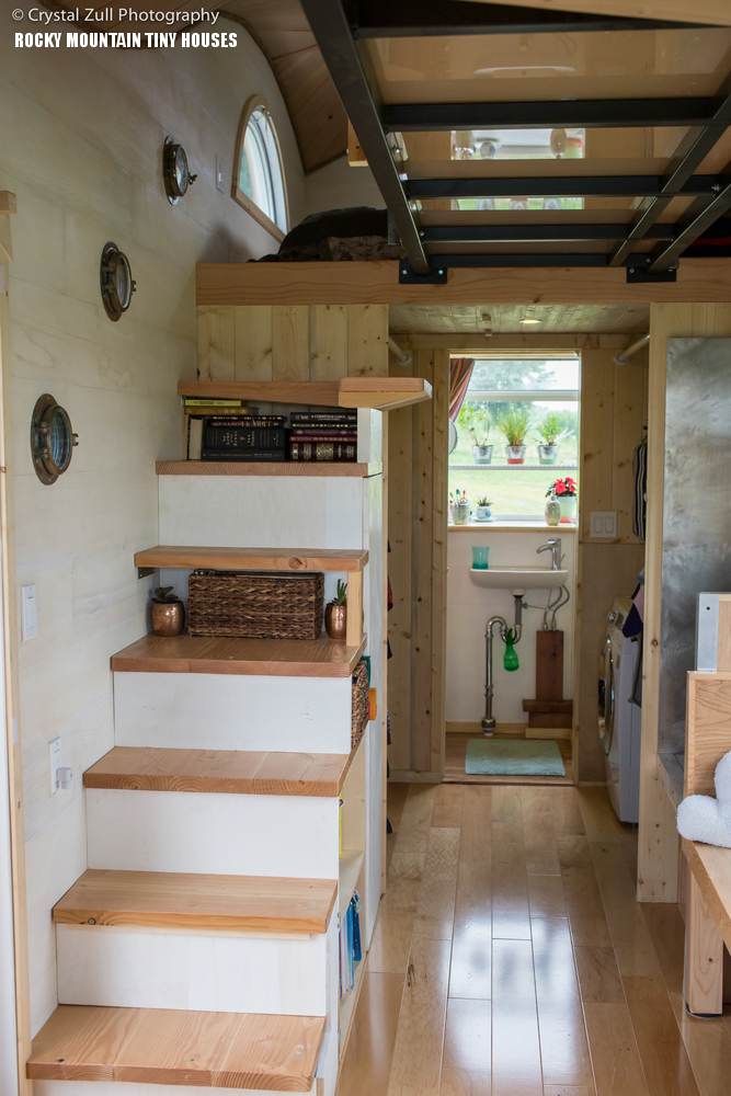 The staircase contains integrated storage