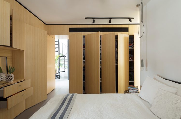a concealed door in the same large closet leads into the master bedroom