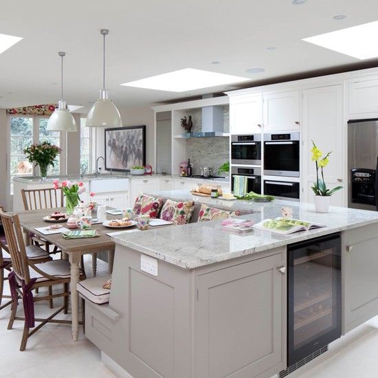 kitchen island with a built-in seating zone