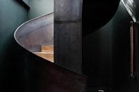 07 sculptural rough metal staircase makes a statement