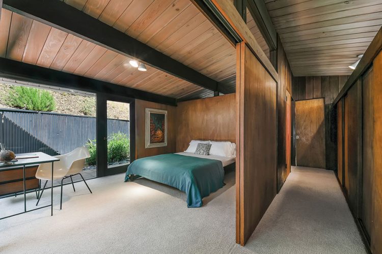 the glazings open the room to the outdoor spaces