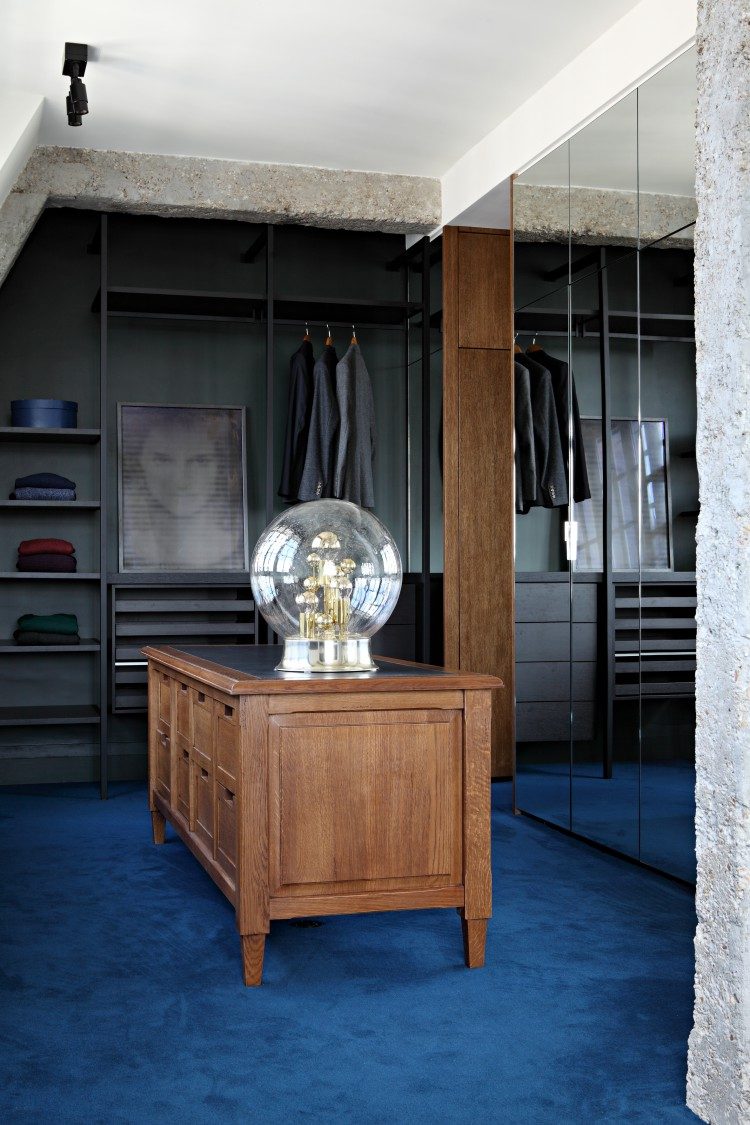 truly masculine closet with a fine wooden sideboard