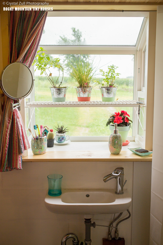 The windows are aluminum and clad with wood, with additional storage spaces