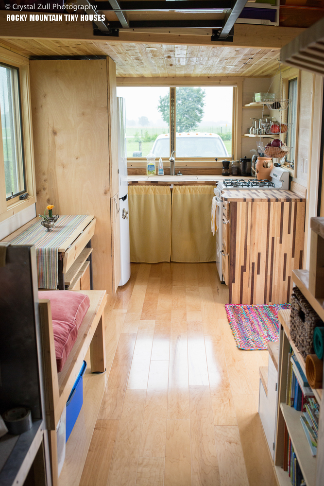 The flooring is birch hardwood, looks very beautiful and reflects light perfectly