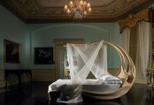 A Bedroom With An Extravagant Canopy Bed
