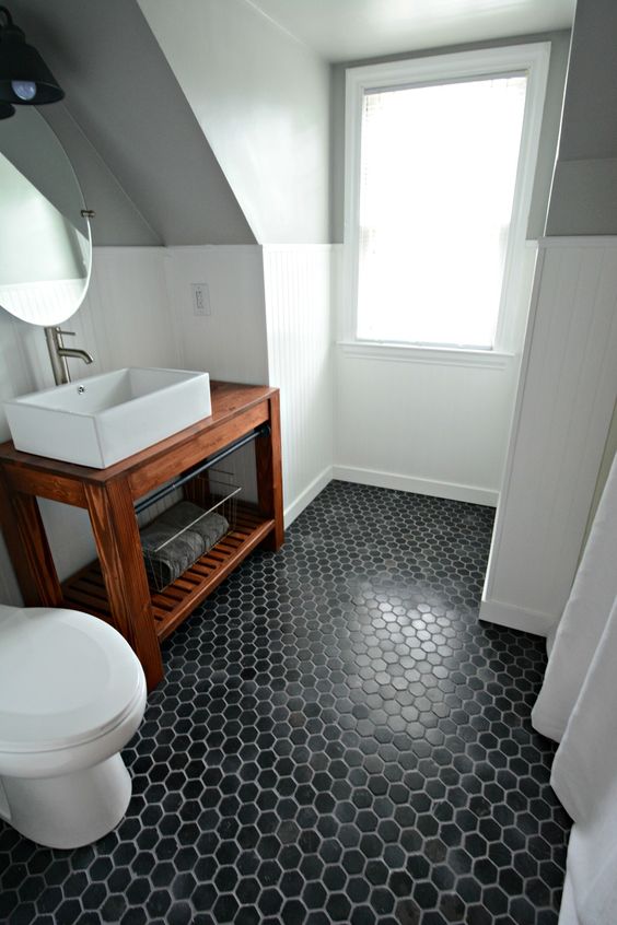 dark tile floor bathroom