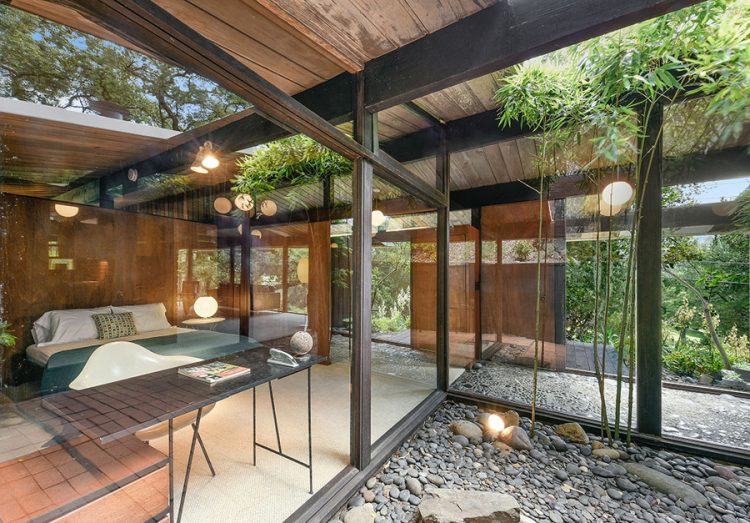 the unusual flat roof design with 'holes' lets a lot of light in