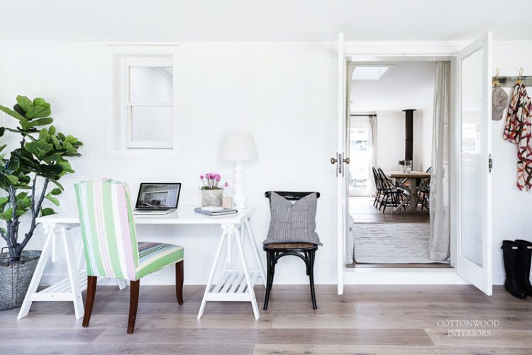 whitewashed sawhorse desk in the home office