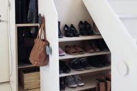 13 shoes drawers undee the stairs
