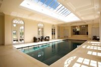 15 large indoor pool wwith a glass roof above