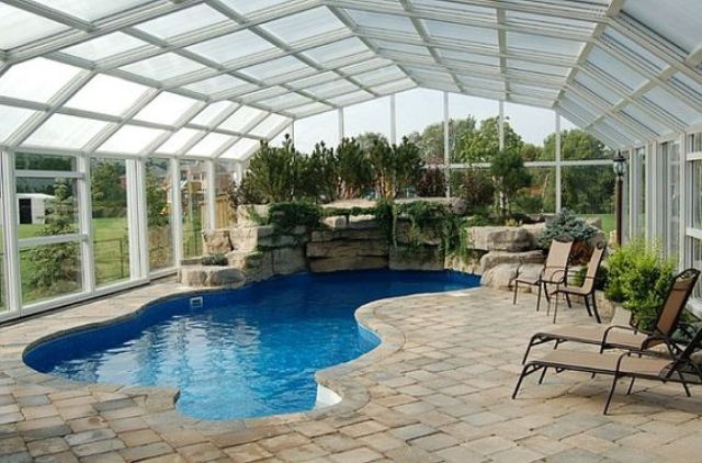 indoor swimming pool of an interesting shape with a view