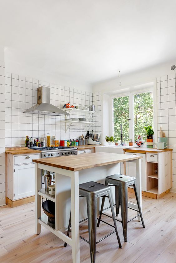 compact kitchen island with a dining area for two