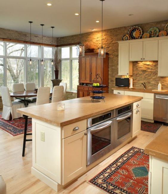 kitchen island with an oven and a grill