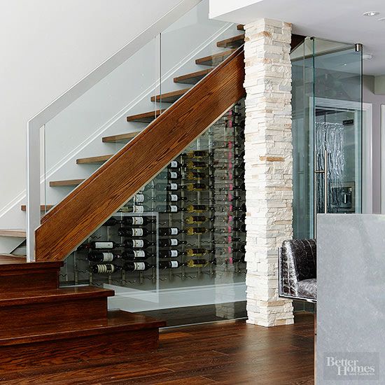 wine cellar under a staircase