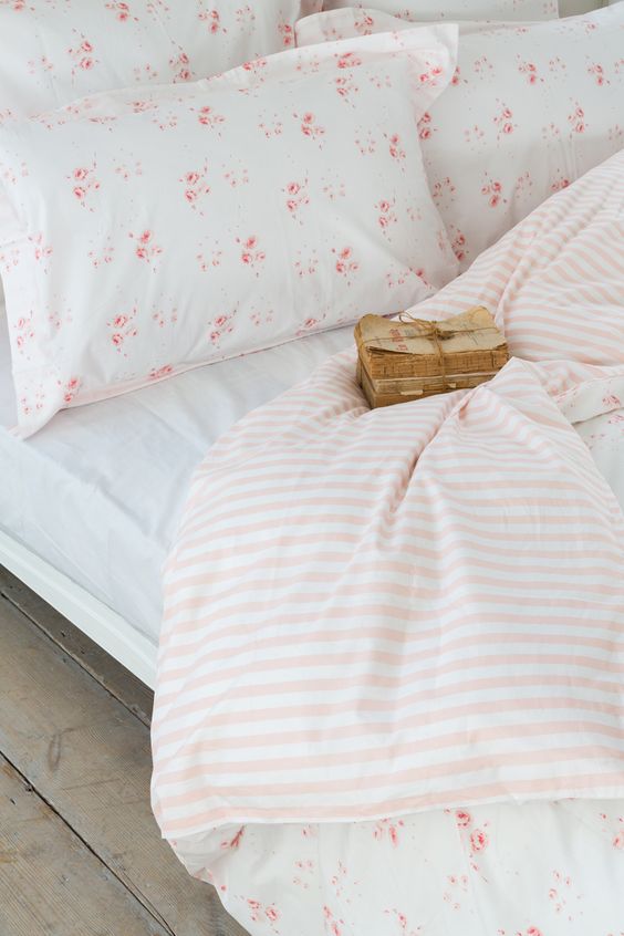 Floral patterns mix well with delicate stripes, just keep them in the same color scheme