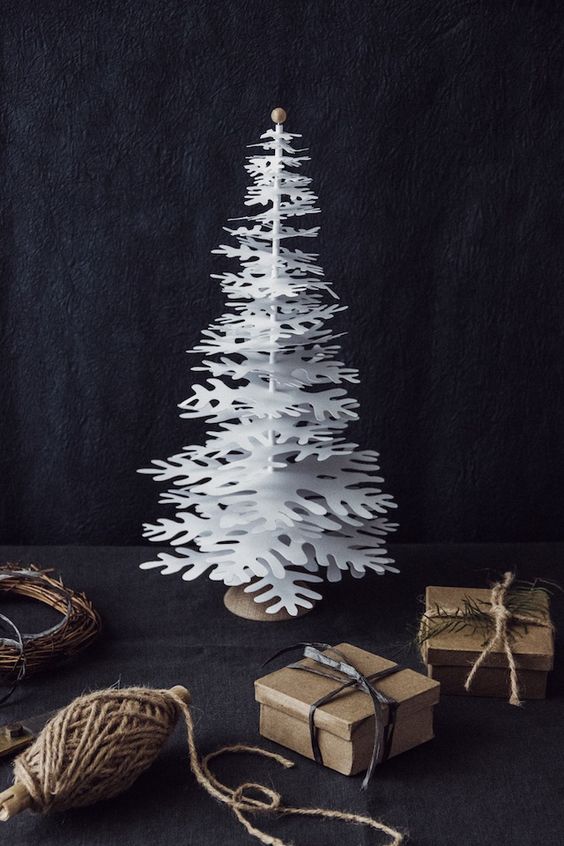 a unique snowflake tabletop Christmas tree is a creative solution for the holidays, it can be rocked in any place