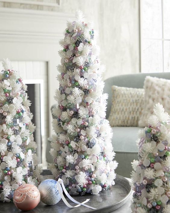 beautiful tabletop Christmas trees composed of beads, pearls and faux evergreens and leaves look ethereal