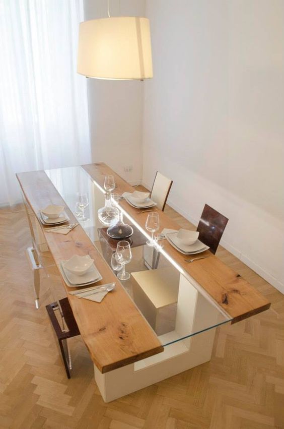 a creative dining table with a glass and wood tabletop and white legs plus built in lights is a stylish idea for a modern dining room
