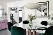a modern dining table with a rich-stained swirl wooden base and a glass tabletop is a catchy idea for a modern dining room