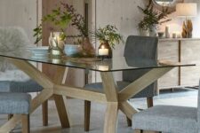 a cool Scandi dining table with a glass top