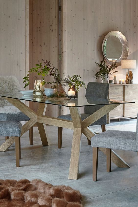a cool Scandi dining table with a glass top