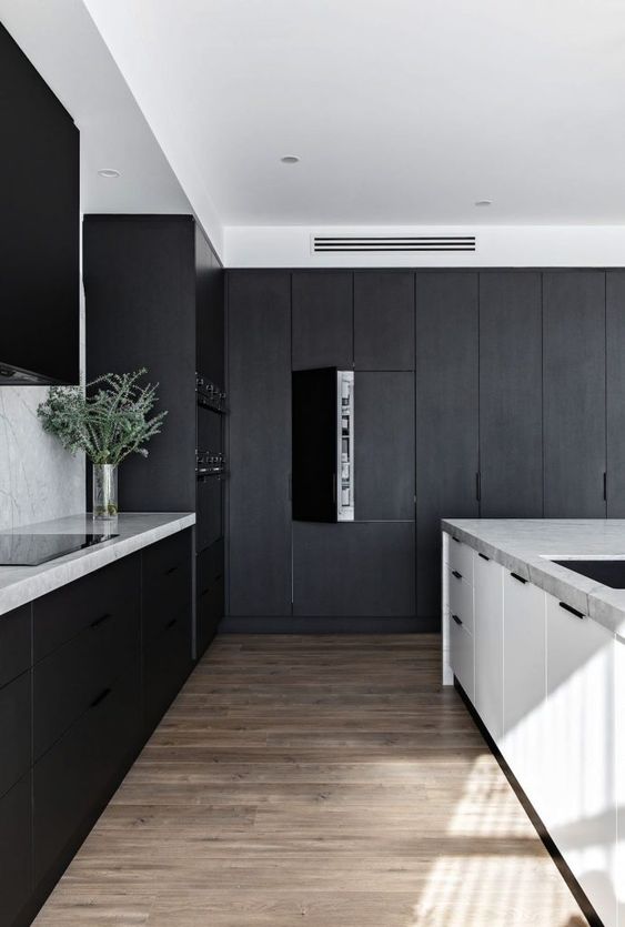 https://www.digsdigs.com/photos/2009/08/a-sophisticated-minimalist-kitchen-with-matte-black-cabinets-white-marble-countertops-a-white-kitchen-island-and-some-built-in-lights.jpg
